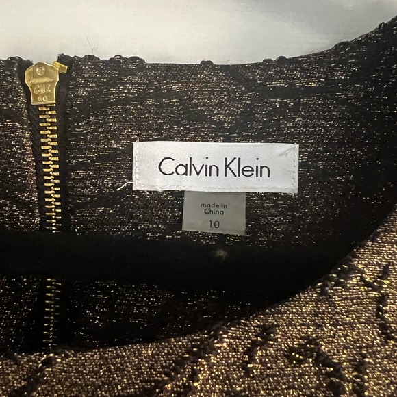 CALVIN KLEIN
Brocade Flounce-Hem Sheath Dress - Picture 6 of 10